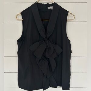 Ellen Tracy Sleeveless Blouse With Bow on the Front and Zipper down the back.